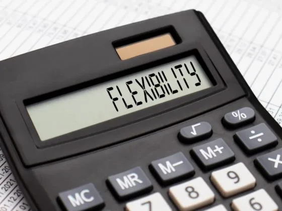 Calculator displaying the word flexibility to highlight the benefits of flexible finance options.